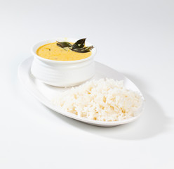 Indian Traditional Cuisine Kadhi Chawal Also Know as Curry Chawal, Yogurt Curry with Rice on White Background