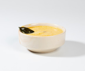 Indian Traditional Cuisine Kadhi Also Know as Curry, Yogurt Curry on White Background