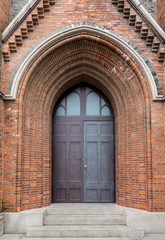 Fototapeta na wymiar The door of Gothic architecture in Shanghai