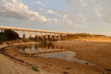 The heritage listed ex railway trestle bridge now part of the Bass Coast Rail Trail, over the...