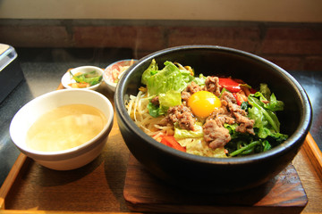 Sizzling Hot Korean Hot Stone Pot Bibimbap with Side Dishes