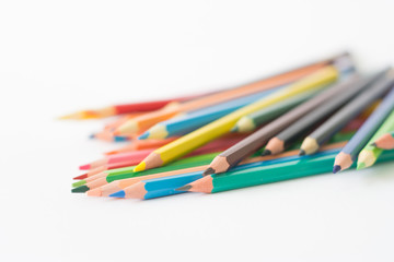 Fototapeta premium image - school supplies - colorful pencils - unorganized