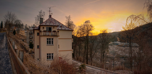 Sunset over the night city