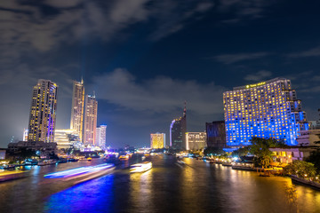Fototapeta premium City view by the river Bright night The beauty of the capital