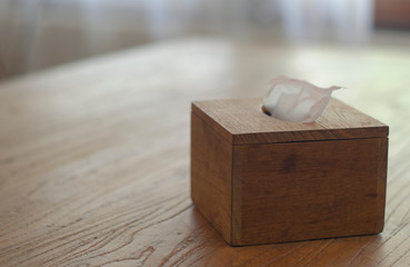 Tissue box on a wooden table