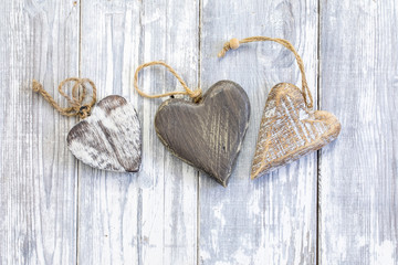 Heart shape on wooden background