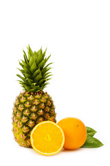 Pineapple and orange isolated on white background.