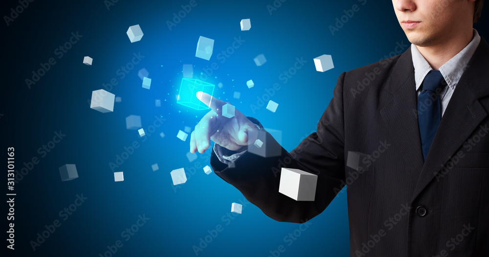 Aufkleber Man touching hologram screen displaying cube symbols