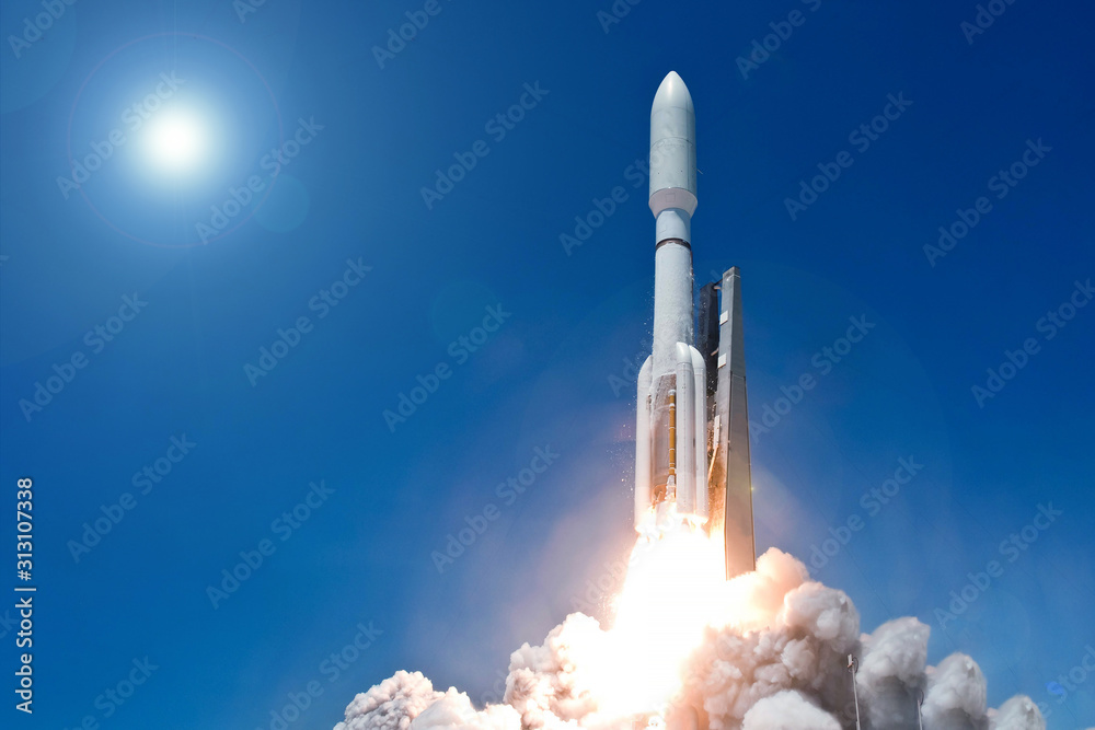 Wall mural take off space rocket on a background of blue sky and sun. elements of this image were furnished by 