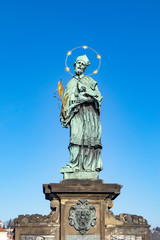 Statue of John of Nepomuk on the Charles bridge in Prague