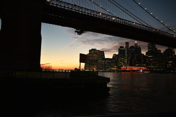 Sunset view under Brooklyn Bridge