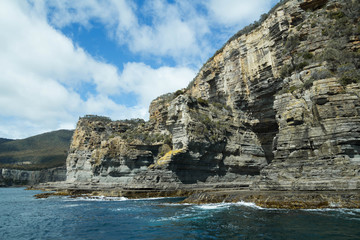 Fototapeta na wymiar Rock formation on the water, in Tasmania.
