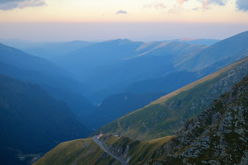 Obraz premium Sunrise on Fagaras high mountain ridge. Romanian mountain landscape with high peaks over 2200m