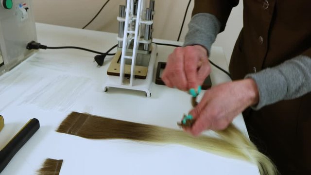 False hair. Hair for hair extension. Hair production for extension