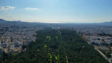 Fototapeta na wymiar Aerial drone photo of famous park of Filadelfia or Philadelfia in a winter morning in the heart of Athens near Parnitha mountain, Attica, Greece