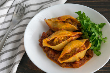 Cheeseburger Stuffed Shells with Shredded Lettuce