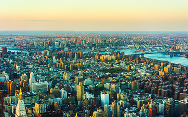 Fototapeta premium Aerial panoramic view on East Village in Downtown, New York city, NYC, USA, Williamsburg Bridge, Brooklyn. East River. Manhattan skyline. American architecture building. Panorama of Metropolis
