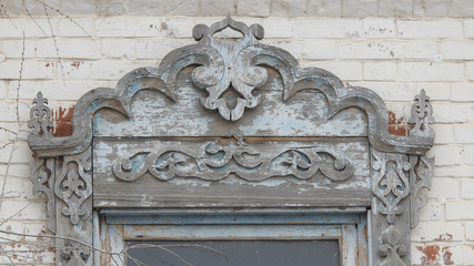 Wooden jambs and lintel of a window