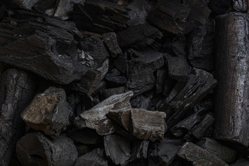 Obraz premium black coal background. charcoal woody black. lot of wood