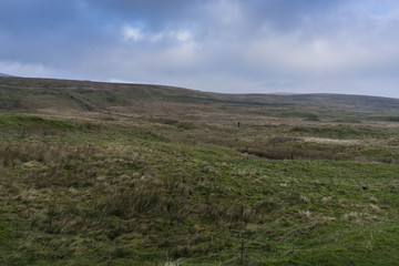 Fototapeta na wymiar The landscapes of the Yorkshire Moors close to the Ribblehead Viaduct in North Yorkshire