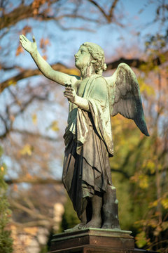 Stone statue of an angel on a german graveyard in Berlin