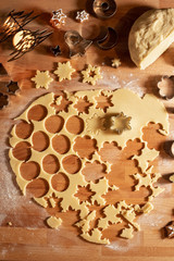 Cutting out star shapes for traditional Linzer Christmas cookies
