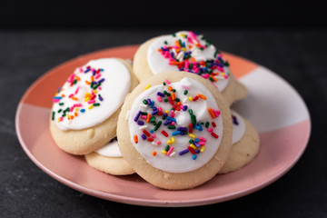 Sprinkle cookies with vanilla icing