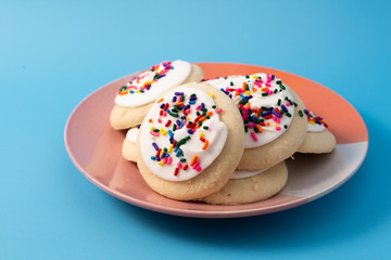 Sprinkle cookies with vanilla icing