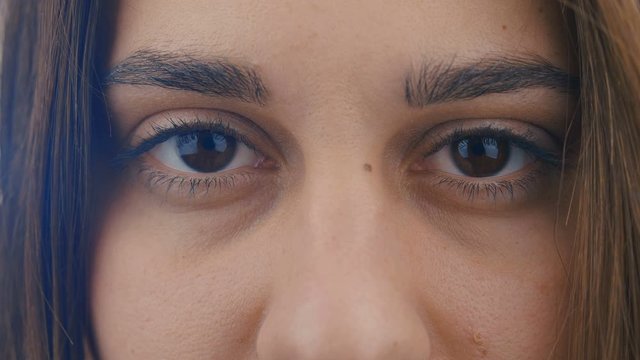 close-up girl eye. macro photography. Close-up portrait of a girl's eye. 4k