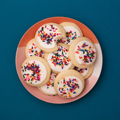 Sprinkle cookies with vanilla icing