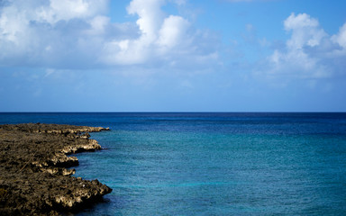 Fototapeta na wymiar Beautiful Landscape with blue ocean and rocks on the beach