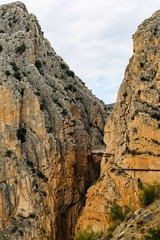 Caminito del Rey hiking trail through a deep narrow gorge. Malaga Spain