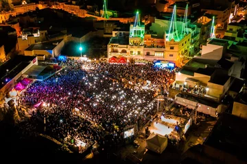 Raamstickers Aerial Shot of a Concert held in Ghaxaq © Sandro