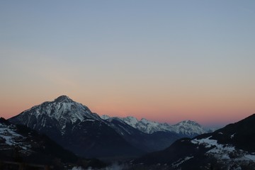 Fototapeta na wymiar sunset winter mountain landscape alps