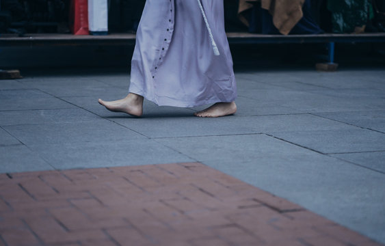 Barefoot Prayer During Christian Celebration.