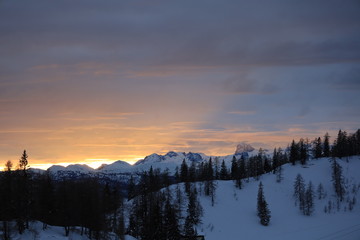 susnest view on Dachstein Austria with red lighting