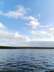 Blue sky and water. Clean lake and air in Sweden.