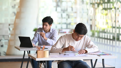 Shot of Architecture team they are working at the office.