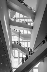 GRONINGEN, NETHERLANDS - DECEMBER 1, 2019: Inside a new building called "Groninger Forum" in the city centre of Groningen. Many escalators in modern building
