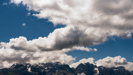 glimpse of the imposing Dolomites of Val di Sole