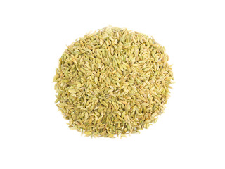 A round bunch of fennel seeds on white isolated background. Indian cuisine, ayurveda, naturopathy concept