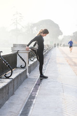 Woman Stretching Before Fitness in Madrid. Sport