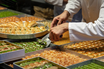 old Istanbul market, a variety of oriental sweets, Traders on the Istanbul market selling a variety...