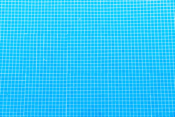 Blue pool bottom with sun highlights 