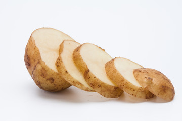 Raw cut potato on white background