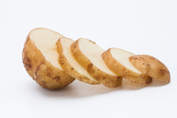 Raw cut potato on white background