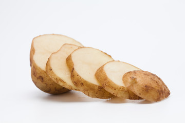 Raw cut potato on white background