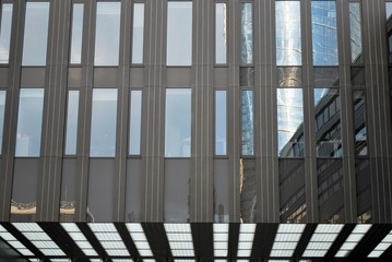 Fototapeta premium The windows of a modern building for offices. Business buildings architecture.