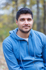 Portrait of young man in nature.
