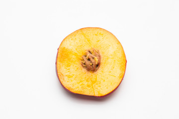Sliced peaches on a white background